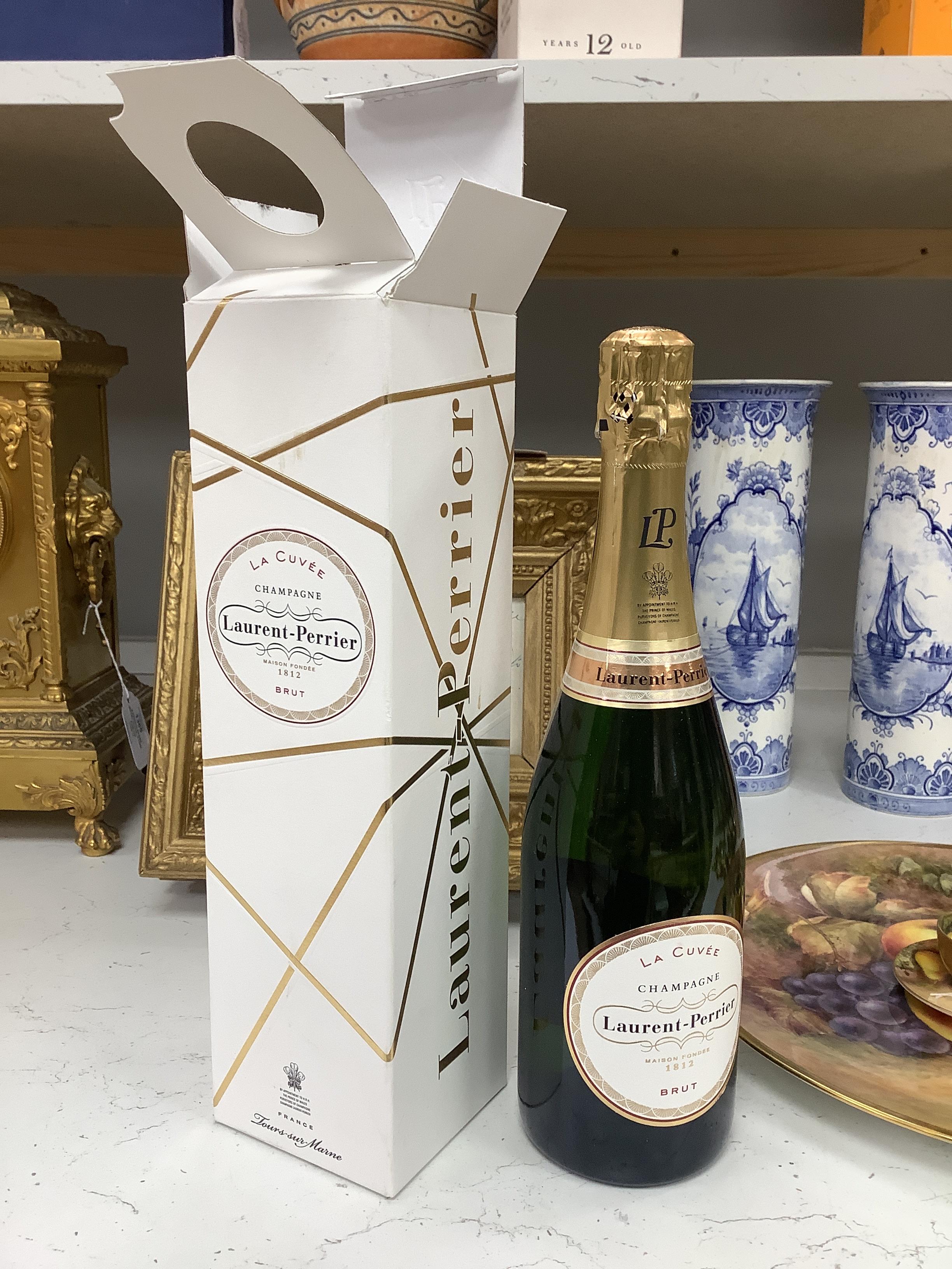Three bottles of champagne including 2003 Bollinger, boxed